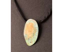 Textured copper oval with green patina