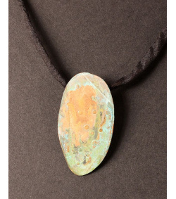 Textured copper oval with green patina