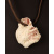 Shell fragment on leather thong